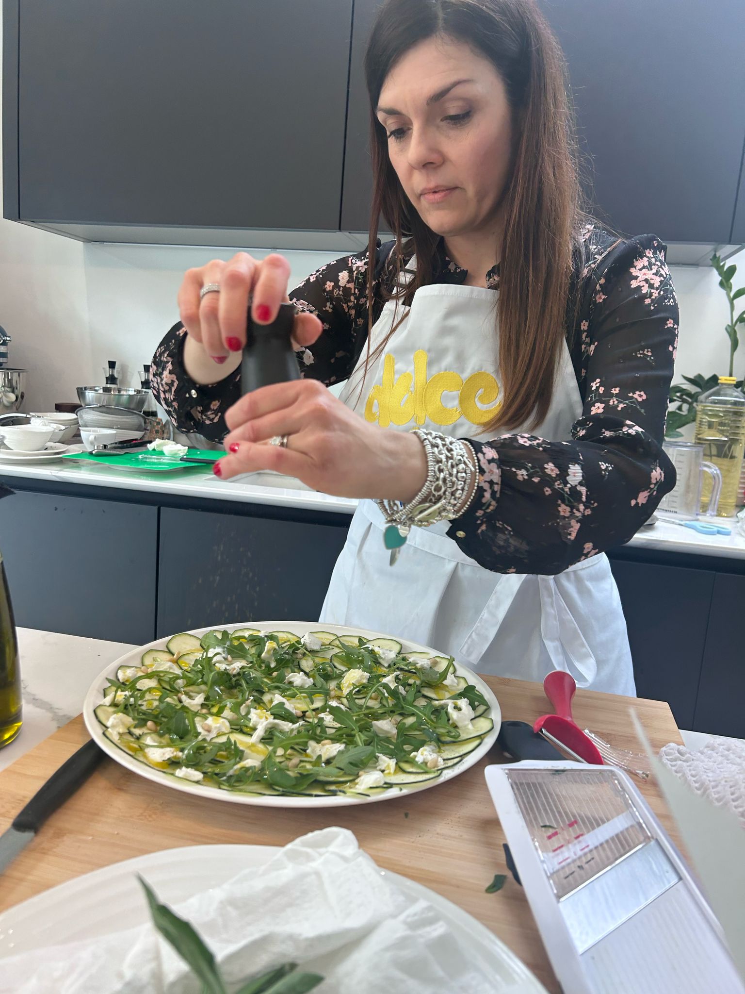 Ilaria preparing courgette carpaccio